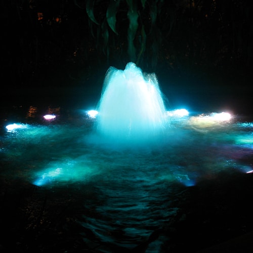 Lit-up fountain at night