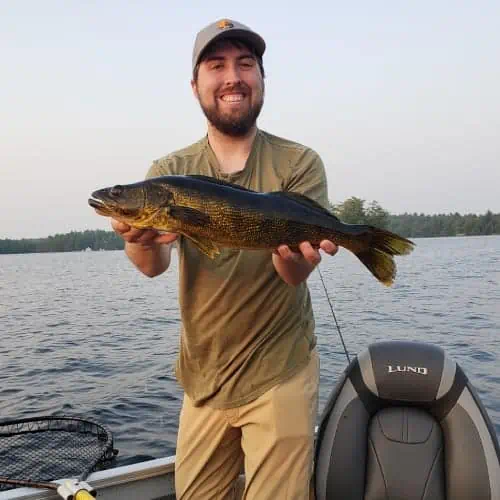 Man holding walleye