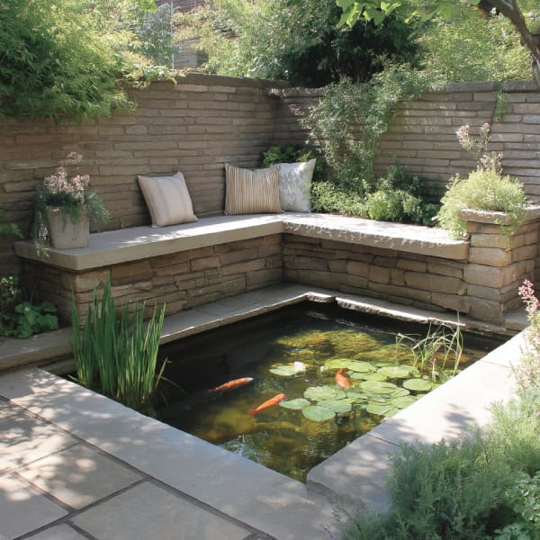 Patio pond with stone seating area