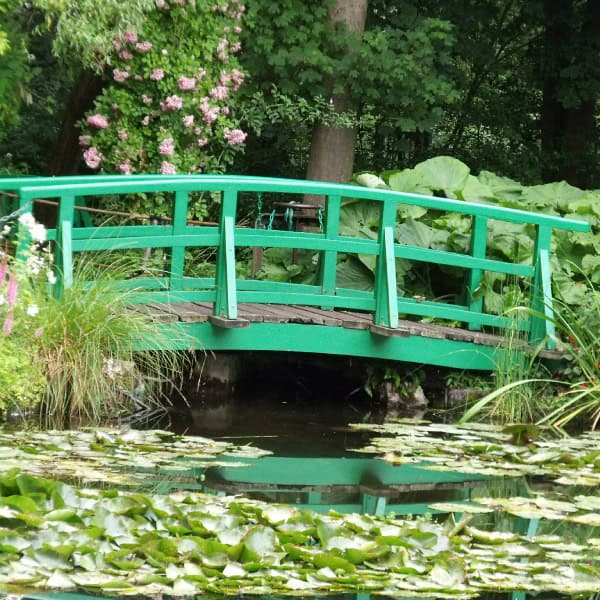 Painted wooden pond bridge